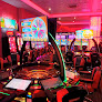 Salón De Juego Jokerbet peluquería en Vélez-Málaga