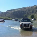 Coches atrapados en el río Benamargosa en Andalucía Directo